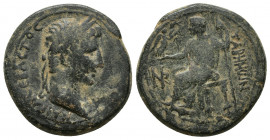 Roman Provincial
CARIA, Tabae. Augustus. 27 BC-AD 14. Laureate head right / Augustus seated left, holding scepter and Victory, who presents filleted w...