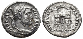 Roman Imperial
Diocletian AR Argenteus. Siscia, AD 294-295. DIOCLETIANVS AVG, laureate head to right / VIRTVS MILITVM, four tetrarchs sacrificing over...