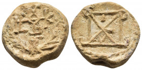 Byzantine Seal
Byzantine Lead Seal (7th Century)
Obv: Crusader monogram of address. Wreath border.
Back: block monogram built on the letter N. Wreath ...