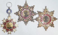 China, Order of Victory 1945, breast badges (2), in silver-gilt and enamels, reverses numbered ‘7210’ and ‘20327’, both lacking suspensions and the se...