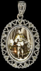 Thailand, Rama V Badge, an oval miniature photograph of standing uniformed figure of Chulalongkorn holding sword, in openwork silver frame with suspen...