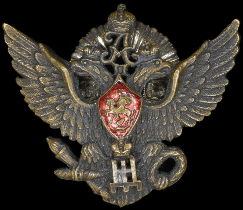 Russia, Elizavetgrad Cavalry School, bronze badge, with red enamelled centre, wi...