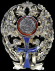 Russia, Moscow Commercial Institute, Graduate’s badge in silver-gilt and enamels, by БрБ, Moscow, 1908-17 (P. & B. I, 2.61), enamel chipped, very fine...