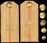 Imperial Russia, a Pair of Shoulder Boards, of straight-patterned fabric with red stripe, with embroidered silver star, gold artillery symbol and bras...