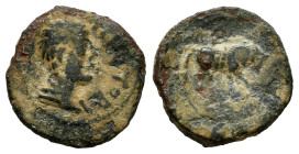 Galia. Pictones. AE 19. 50-30 BC. (De la Tour 4349). (Bmc-196). Anv.: ATECTORI, draped male bust right. Rev.: Bull advancing right; pellet-in-circle a...