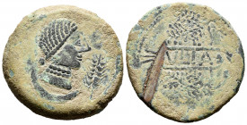Ulia. Unit. 50 BC. Montemayor (Córdoba). (Abh-2492). Anv.: Female head right, ear of corn before, iberian letter TA behind, crescent below. Rev.: Vine...