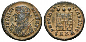 Licinius I. Follis. 318-320 AD. Heraclea. (Ric-38a). Anv.: IMP LICINIVS AVG, laureate bust left, wearing imperial mantle, holding globe, scepter and m...