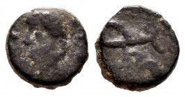Nummus. Century VI. Emerita (Mérida). (Cru-Group C, Type 171). Anv.: Very elementary left effigy. Rev.: Monogram formed by an M with ties at the ends....