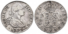 Charles IV (1788-1808). 2 reales. 1799. Madrid. MF. (Cal-607). Ag. 5,80 g. Planchet flaw on reverse. Almost VF. Est...25,00. 


 SPANISH DESCRIPTIO...