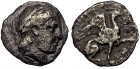 Asia Minor. Uncertain mint circa 300-100 BC. Diobol AR
Wreathed head of Apollo (or Dionysos?) right.
Rev: Illegible inscription, Griffin standing righ...