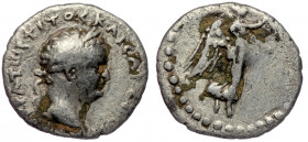 CAPPADOCIA, Caesarea Titus (79-81) AR hemidrachm 
AYKPATωP TITOC KAICAP CEBA - laureate head right 
Rev: Nike advancing right, holding wreath and palm...