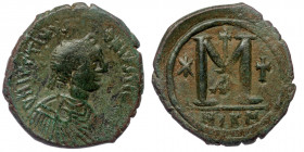 Justin I and Justinian I (AD 527). AE32 follis or 40 nummi. Nicomedia, 1st officina. 
D N IVSTINVS-D N IVSTINIVS - pearl-diademed, draped and cuirasse...