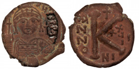 Justinian I AD 527-565. Nikomedia AE25 Half Follis or 20 Nummi
[D N IVSTINI]ANVS P P AVG, helmeted and cuirassed bust facing, holding globus cruciger ...
