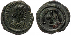 Justinian I (527-565) Theoupolis (Antioch) Pentanummium AE16.
Diademed, draped and cuirassed bust of Justinian I right 
Rev: Large Є with cross-bar on...