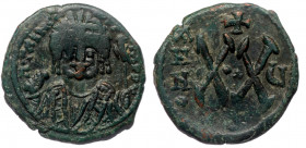Maurice Tiberius (582-602) AE Half Follis, Theoupolis (Antiochia). 
D m TIЧ COTANS P AV - Crowned facing bust of Maurice Tiberius, wearing crown surmo...