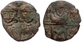 CONSTANTINE V COPRONYMUS with LEO IV and LEO III (741-775) AE18 Follis. Constantinople.
Crowned and draped facing busts of Constantine V and Leo IV; c...