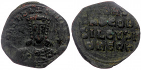 Constantine VII and Romanus AE Follis Constantinople 913-959 AD.
Crowned bust of Constantine facing, with short beard and wearing vertical loros, hold...