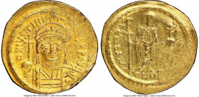 Justinian I the Great (AD 527-565). AV solidus (21mm, 7h). NGC AU, edge bend. Constantinople, 4th officina, ca. AD 545-565. D N IVSTINI-ANVS PP AVG, c...