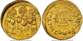 Heraclius (AD 632-641), with Heraclius Constantine and Heraclonas as Caesar. AV solidus (18mm, 4.47 gm, 6h). NGC Choice AU 4/5 - 3/5. Constantinople, ...