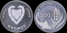 CYPRUS: 500 Mils (ND 1981) in copper-nickel commemorating the World Food Day with shielded Arms within wreath. Denomination divides swordfish and grai...