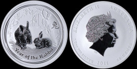 AUSTRALIA: 50 Cents (2011 P) in silver (0,999) commemorating the Year of the Rabbit with head of Queen Elizabeth II facing right. Mother and baby rabb...