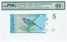 NETHERLANDS ANTILLES: 5 Gulden (31.3.1986) in dark blue on multicolor unpt with Troupial at center. S/N: "0033398721". WMK: Banks logo. Printed by JEZ...