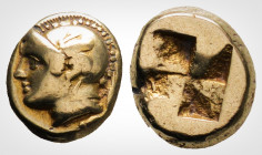 Greek 
Ionia. Phokaia. (Circa 478-387 BC)
EL Hekte. (10,04 mm, 2.50 g)
Helmeted head of Athena left; below, small seal left. / Quadripartite incuse sq...