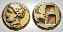 Greek
Ionia, Phokaia. (Circa 387-326 BC.)
EL Hekte (10,2mm, 2.52 g)
Head of female left, hair tied in knot above / Quadripartite incuse square. Bodens...