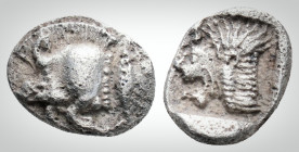Greek 
Mysia. Kyzikos. (Circa 450-400 BC)
AR Obol (10.1 mm, 0,74g.)
Forepart of boar left; tunny to right / Head of roaring lion left; retrograde K in...