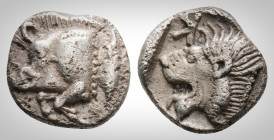 Greek
Mysia. Kyzikos. (Circa 450-400 BC). 
AR Obol . (9.3 mm, 0,77g.).
Forepart of boar left; tunny to right. /Head of roaring lion left; retrograde K...