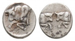 Greek
Caria, Uncertain mint. (Circa 500-450 BC ).
AR tetartemorion (7.6 mm, 0.32 g.)
Forepart of bull left. / Two foreparts of bulls confronted. SN...