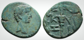 Roman Provincial
Mysia, Kyzikos. Augustus (27 BC - AD 14) 
AE Bronze (17.4 mm 3.12 g).
Obv: Bare head right.
Rev: KY – ZI, Torch within wreath.
RPC I ...