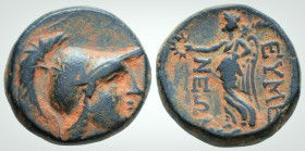 Roman Provincial
PHRYGIA. Eumenia. After 133 BC. 
AE Bronze (18.4 mm 6.7 g). 
Obv: Helmeted head of Athena right.
Rev: ΕΥΜΕ / ΝΕΩΝ , Nike walking left...