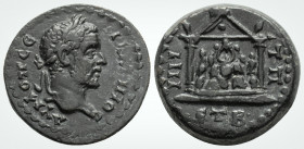 Roman Provincial
CAPPADOCIA, Caesaraea-Eusebia. Macrinus. AD 217-218. Dated RY 2 (AD 218).
AE (19.3 mm 5.5 g). 
Obv: Laureate head right.
Rev: Distyle...