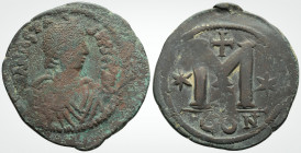 Byzantine
Anastasius (491-518 AD ) Constantinople 
AE Follis (39.2mm 17 g) 
Obv: Diademed, draped and cuirassed bust right 
Rev: Large M, off. E (?) (...