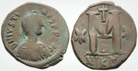 Byzantine
Justin I. (518-527 AD) Nicomedia
AE Follis (33.5mm, 16.8 g,). 
Nicomedia mint, 2nd officina. Struck 518-527. 
Obv:Pearl-diademed, draped and...