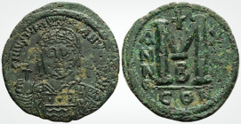 Justinian I (527-565 AD),Costantinople 
AE Follis, (38.4 mm 22.47 g) 
Obv: DN-IVSTINI ANVS AVG PP, draped bust with helmet in front view, holding glob...