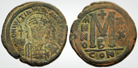 Byzantine
Justinian I ( 527-565 AD ) Constantinople 
AE Follis (33.9mm., 19,8g)
Obv :D N IVSTINIANVS P P AVG, helmeted and cuirassed bust facing, hold...