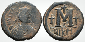 Byzantine Coins
JUSTINIAN I (527-565).Nicomedia. 
AE Follis. (30.1 mm 16.4 g) 
Obv: D N IVSTNIANVS (sic) P AVG. Diademed, draped and cuirassed bust ri...