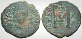 Byzantine
justinian I, Antioch, year 20 = AD 546/7. ( 527-565AD). 
AE Follis (35.3 mm 20 g). 
Obv: D N IVSTNIANVS PP AVG draped bust with helmet in fr...