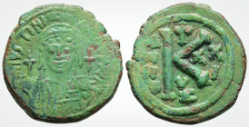Byzantine
Justinian I (527-565. AD ) Cyzicus. 
AE Half Nummus. (16.5mm, 9.69 g,) 
Obv: D N IVSTINIANVS P P AV, helmeted and cuirassed facing bust, hol...