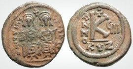 Byzantine
Justin II. (565-578.AD)Cyzicus 
AE Follis (23.5mm, 6 g)
Obv: DN IVSTINVS PP AVG legend with Justin on the left, holding cross on globe and S...