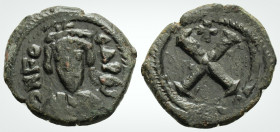 Phocas. 602-610. Constantinople 
AE Decanummium (18.7mm, 2.64 g,) 
Obv: Crowned, draped, and cuirassed facing bust 
Rev: Large X; cross above. DOC 39;...