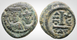 Heraclius, with Heraclius Constantine. (610-641AD.)Catania AE Decanummium (16mm, 4.2 g,).Obv : Crowned, draped, and cuirassed busts of Heraclius and H...