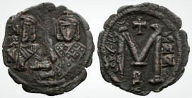Leo III the "Isaurian" (717-741 AD)Constantinople
AE half Follis (21.1mm, 2 g,) 
Obv : Leo and Constantine holding patriarchal cross between them. 
Re...