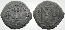 Byzantine
Theophilus (829-842.AD) Constantinople 
AE Follis (30.8mm., 6.2g.) 
Obv: ✷ • ΘЄO-FIL' ЬASIL', crowned and draped bust facing, holding patria...
