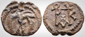 Byzantine Lead Seal (7th Century) Patrikios
Obverse: Eagle with spread wings, symbolizing strength and victory. Wreath border.
Back: Block monogram ba...