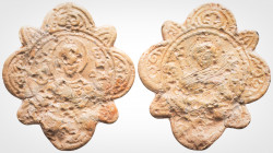 Amulet (10-11th century)
Busts with halos on both sides. from the front. With borders. Edge decorations are available. Rosette with 8 (eight) corners....