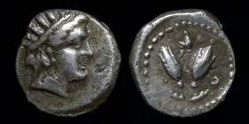 CARIA, Rhodes (c. 394-304 BCE) AR Diobol. 0.92g, 10mm.
Obv: Radiate head of Helios right.
Rev: P - O; Two rose buds; Phrygian helmet between.
SNG Cope...