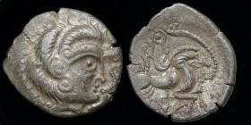 NORTHWEST GAUL: Coriosolites, Billon Stater ca. 100-50 BC. 6.16g, 23mm. 
Obv: Celticized head of Apollo r.; ornament before
Rev: Celticized driver in ...